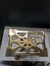 A Brass Three Legged Trivet