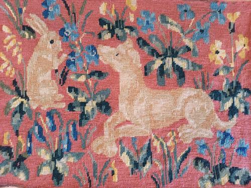 Completed needlepoint cushion