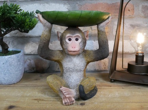 Quirky resin monkey with leaf - quirky,