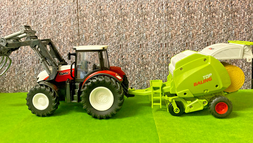 Tractor with front end - end, bale