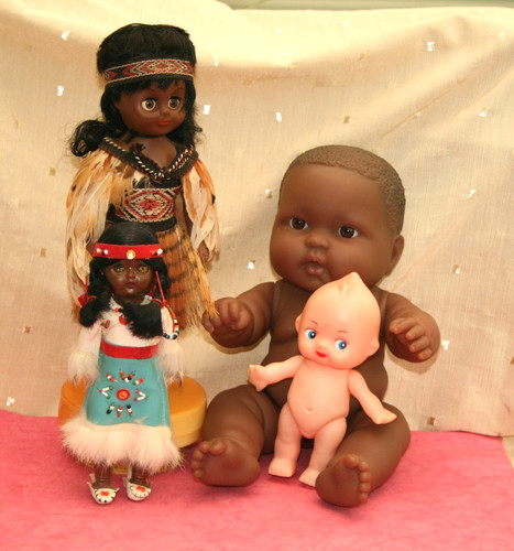 Four dolls white kewpie - dolls,,