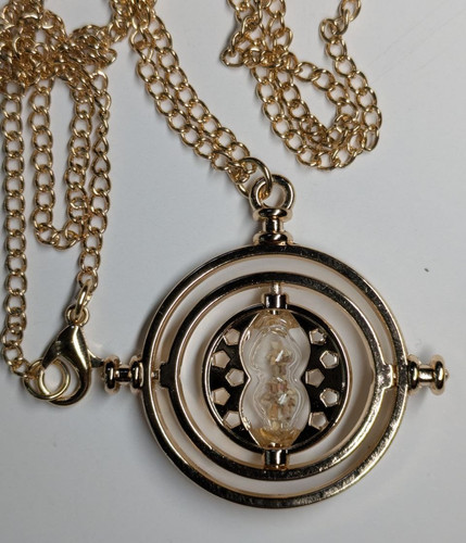 Gold tone rotating - gold, time