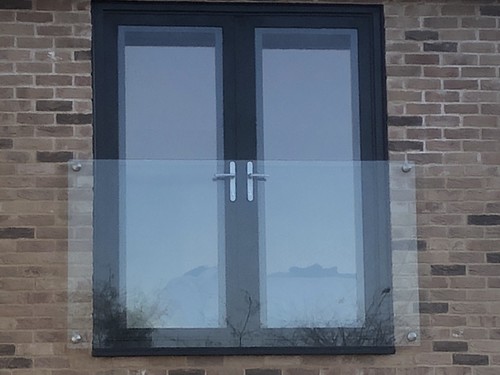 Frameless glass juliet balcony - glass,
