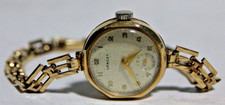 BEAUTIFUL LADIES 9ct GOLD WATCH ON A 9ct GOLD STRAP - LANCET - 14.7 GRAMS