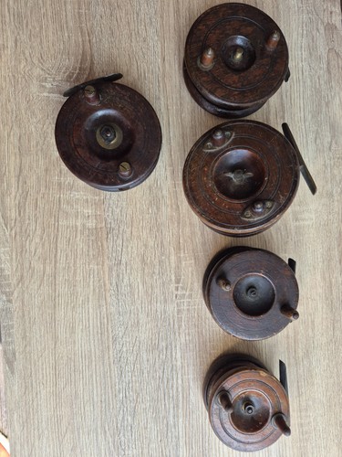 Vintage wooden fishing reels - reels,