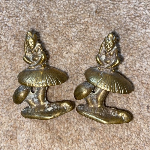 Pair vintage solid brass - a, of