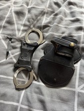 Rigid Handcuffs And Holder