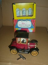 Schuco. Ref no. 1227. Oldtimer. 1917 Ford T Coupe, in Maroon. Clockwork. Mint.