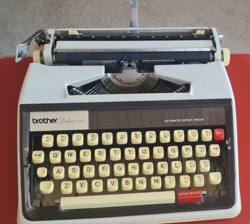 Brother deluxe 1350 portable - brother,