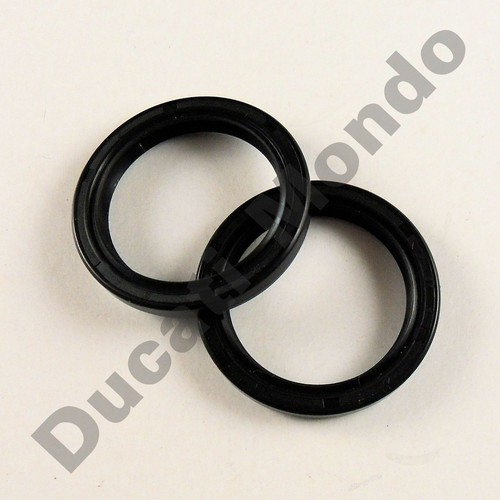 Swing arm pivot seal rings