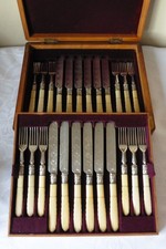 Oak Case of 24 Vintage Carved