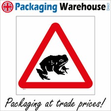 TR513 FROG TOAD ON ROAD SIGN