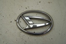 Daihatsu Sirion front badge