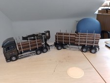 VOLVO FH16 750XL LOGGING TRUCK WITH DRAWBAR TRAILER AND HIAB CRANE.