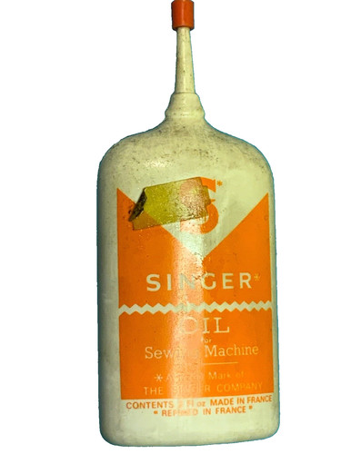 Singer sewing machine oil - machine,