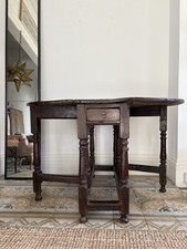 A 17th Century Oak Gateleg Table with Turned Baluster Legs and Single Drawer