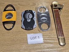 LOT 1 Four Cigar cutters
