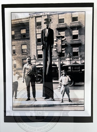 1930s man stilts - on, tuxedo
