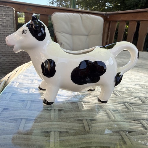 Black and white cow shape - and,