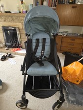 Babyzen Green Yoyo Pushchair with Bassinet and Raincover. Good Condition