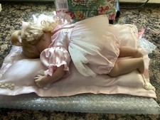 porcelain doll Sleeping On A