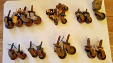 19 vintage castors, brass