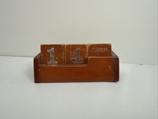 A VINTAGE WOODEN PERPETUAL
