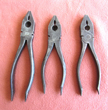 3 sets of pliers. Vintage car
