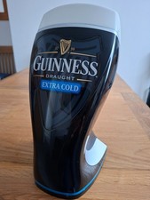 Guinness extra cold beer font with light 