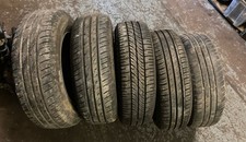 06-19*VAUXHALL CORSA D/E SET OF 185/70R14 STEEL RIMS AND TYRES WITH WHEEL COVERS