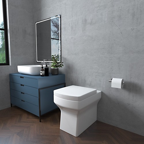 Bathroom btw back - to, wall