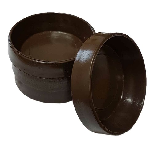 Brown plastic castor cups - castor,