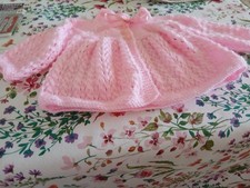 hand knitted matinee coat in
