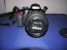 Nikon D3100 + Lens AF-S DX