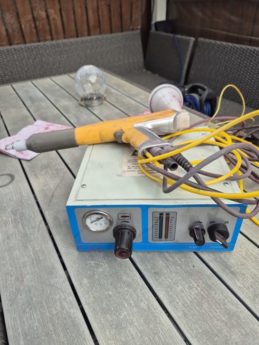 Portable electrostatic powder