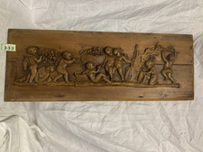 plaster on pine bas -relief