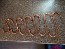 SET OF 6  GRADUATING ANTIQUE COPPER POT HOOKS