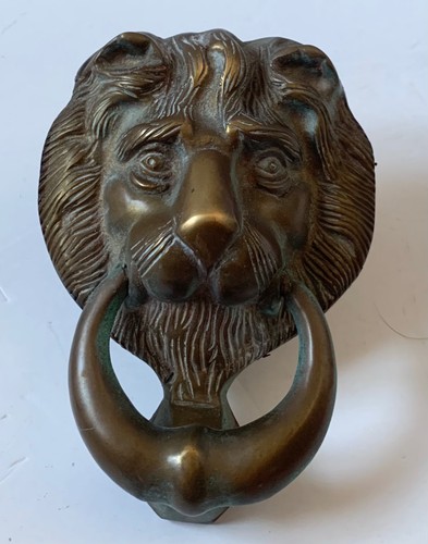 Vintage brass lions head door - head,