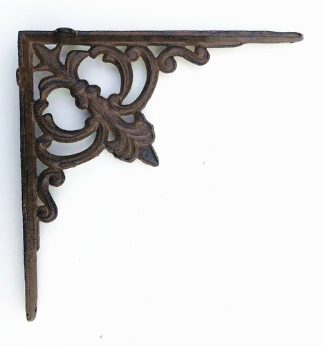 Cast iron ornate shelf bracket - cast,