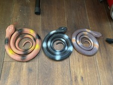 3 Plastic toy Snakes