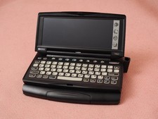 Hewlett Packard HP 620LX Palmtop PC Model F1250A No Battery with Dock Untested