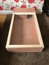 tortoise table 4foot long 2 foot wide. 8 inch high walls with a mesh lid