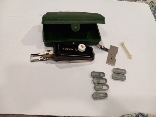 Singer sewing machine button - singer,
