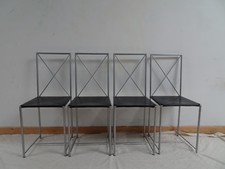 A set of four Moka flexform contemporary Dining chairs excellent condition
