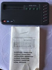 VINTAGE ZEON TECH 6 LANGUAGE TRANSLATER,CLOCK,CALCULATOR,& CURRENCY CONVERTER 