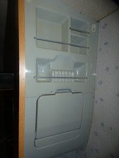 Caravan bathroom wall panel and drop down sink