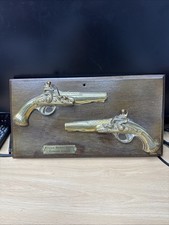 flintlock duelling pistols eigteenth century brass on plaque wall hanging