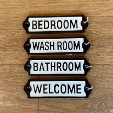 VINTAGE DOOR SIGNS CAST IRON