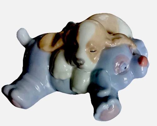 Lladro puppy resting his - lladro,