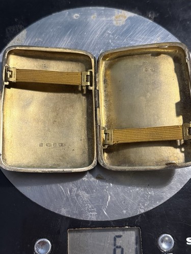 Silver cigarette case with - cigarette,